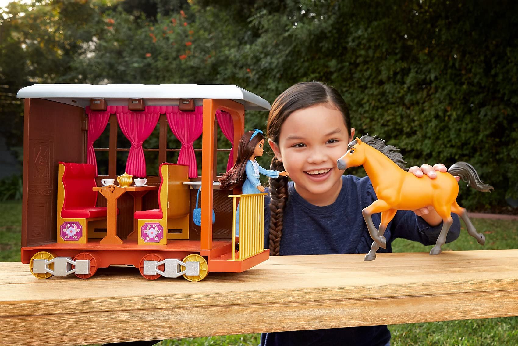 Mattel Spirit Untamed Lucky’s Train Home Playset, Train with Rolling Wheels Balcony, Dining Accessories, Lucky Doll (7-in), Spirit (Approx.8-in) & More, Great Gift for Ages 3 Years Old & Up