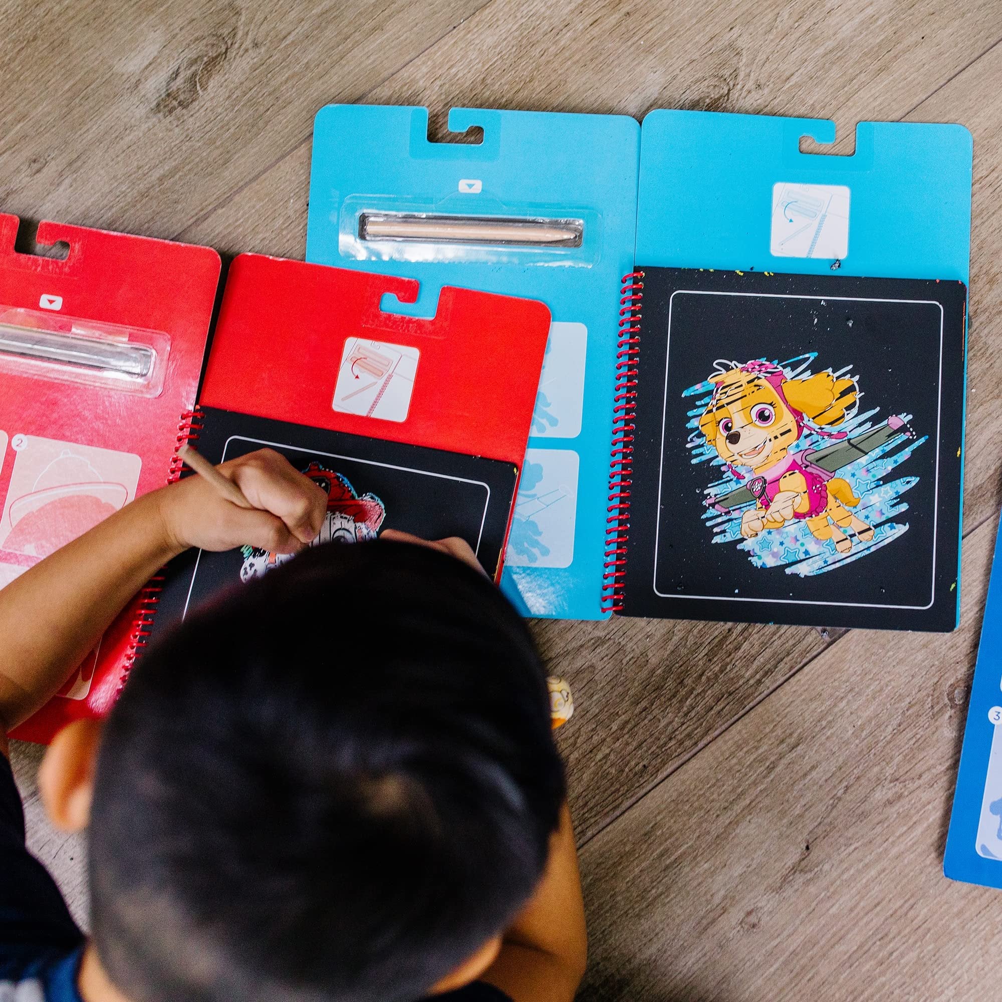 Melissa & Doug PAW Patrol Scratch Art Pad - Marshall Colour Reveal Travel Activity Pad