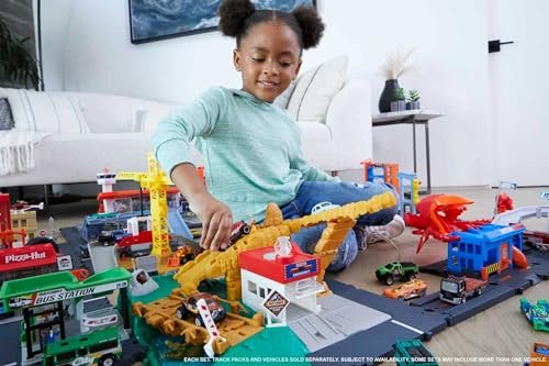 Hot Wheels City Toy Car Track Set, Downtown Car Park Playset with 1:64 Scale Vehicle, 4 Levels, Working Lift & Exit Chute