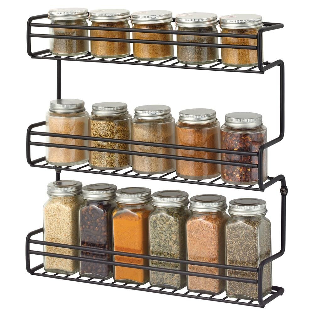 mDesign Metal Wall Mount Kitchen Spice Bottle Rack Holder, Food Storage Organizer for Cabinet, Cupboard, Pantry, Shelf - Holds Spices, Jars, Baking Supplies, Cans, 3 Tier - Black